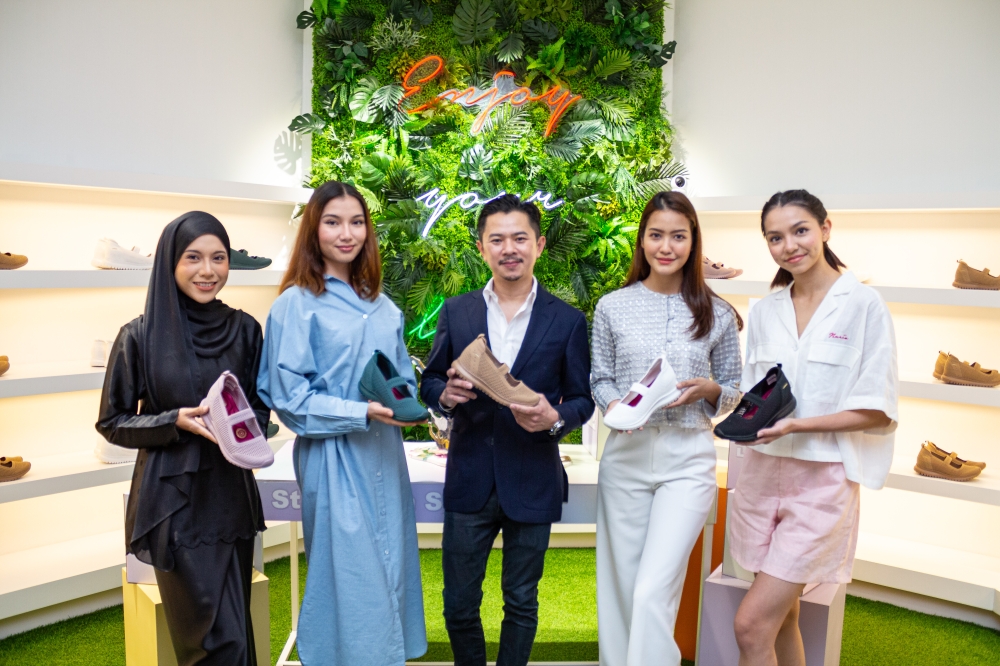 Chong with models at the collection’s launch at Larrie store in Alamanda.