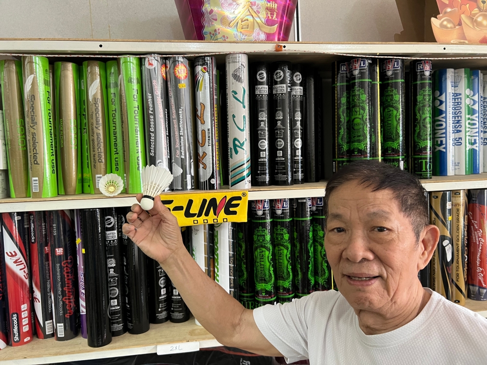 Lim Chong Sitt, 75, who owns Sitt Sport Centre, said prices of shuttlecocks have increased three times this year, up to RM10 per tube, with the high-end ones costing about RM170 per tube. — Picture by Opalyn Mok