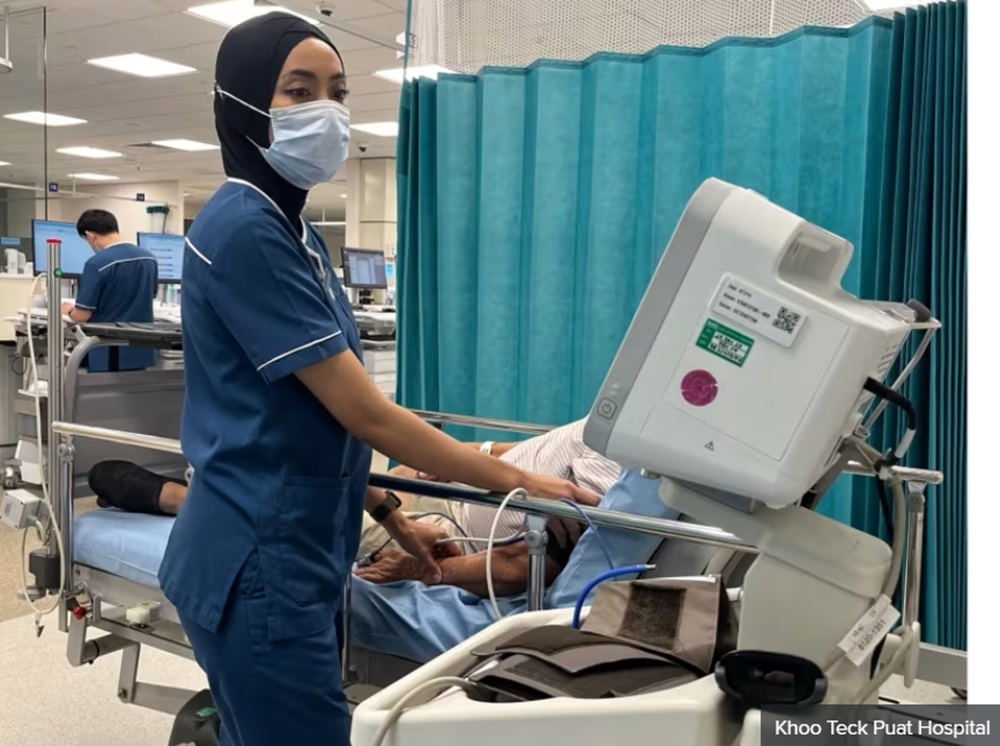 Senior staff nurse Siti Farhana Jumari at work in Khoo Teck Puat Hospital. — Picture courtesy of Khoo Teck Puat Hospital