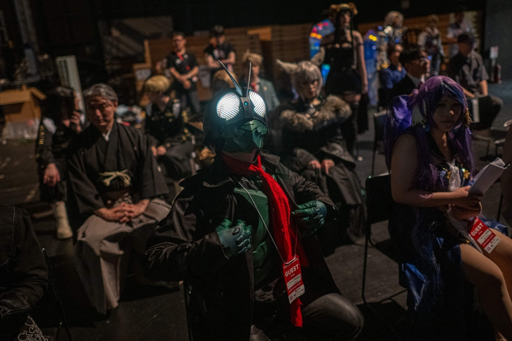 Competitors from 36 countries stand by backstage before the world cosplay championship 2024 during the World Cosplay Summit in Nagoya August 3, 2024. — AFP pic