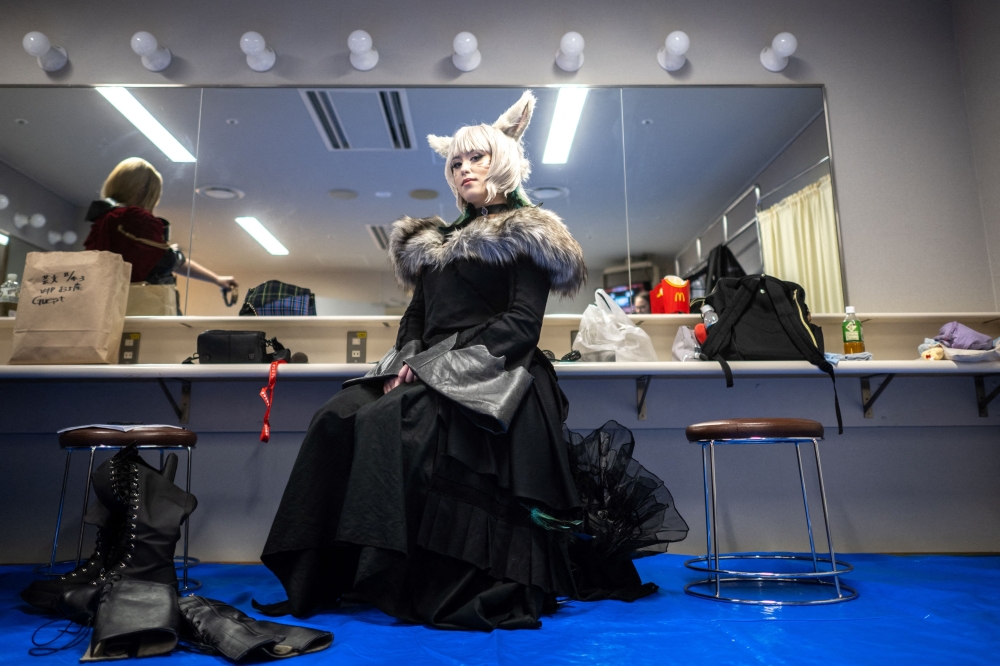 The judge and last year’s winner Lettie Shiels sits in the dressing room before the world cosplay championship 2024 during the World Cosplay Summit in Nagoya August 3, 2024. — AFP pic