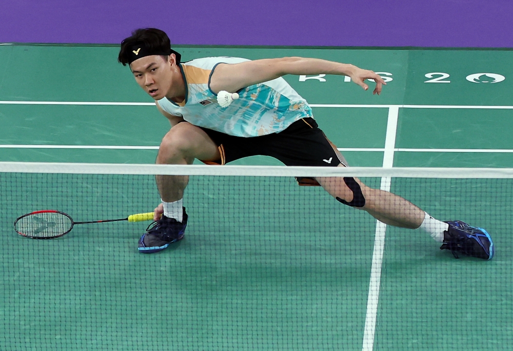 Malaysia’s men’s singles Lee Zii Jia is seen in action against India’s Lakshya Sen in the bronze medal match of the Paris 2024 Olympics men’s singles badminton event at the Porte De La Chapelle Arena in Paris August 5, 2024. — Bernama pic