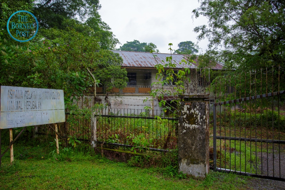 The entrance and old signboard of the Nurses’ Quarters. — Picture by Faisal Ahmad