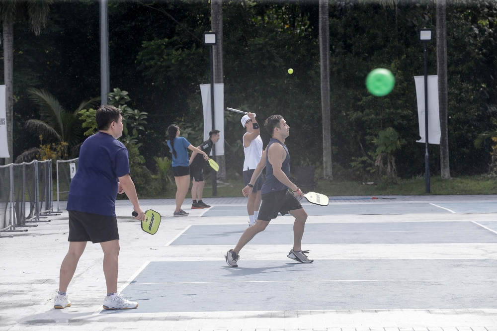 Pickleball is quickly becoming the favourite new sport for many, thanks to its easy-to-learn, miniature tennis-like concept. — Picture by Sayuti Zainudin