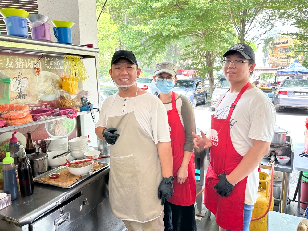 Lim Eng Lian and his family are the ones behind this pork noodles stall. — Picture by Lee Khang Yi