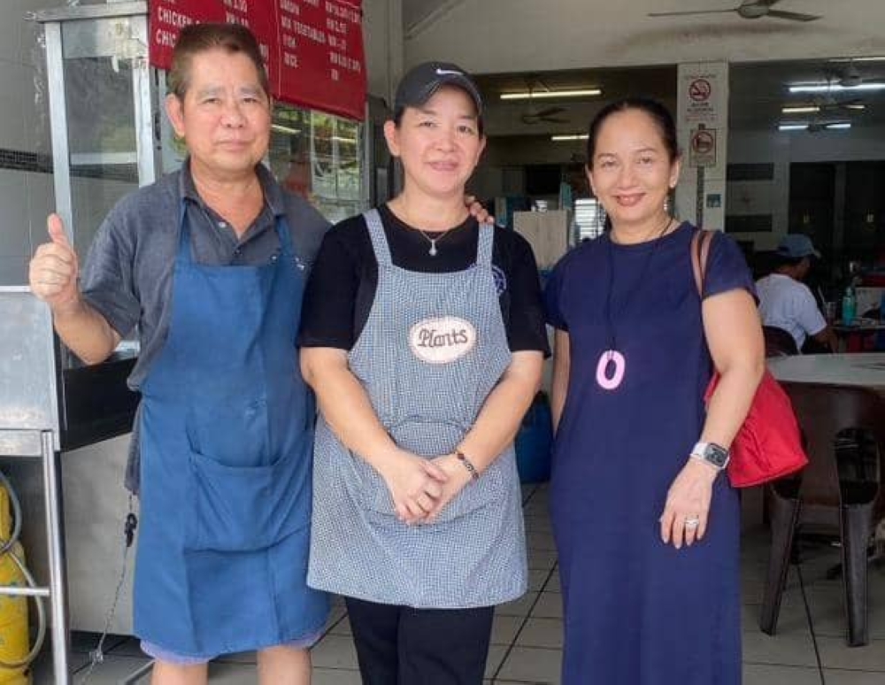 An undated file photograph shows Yoong Ong Swai and wife Maggie Yee with local singer Datuk Sheila Majid (right) at Restoran Vegas. — Picture courtesy of Maggie Yee