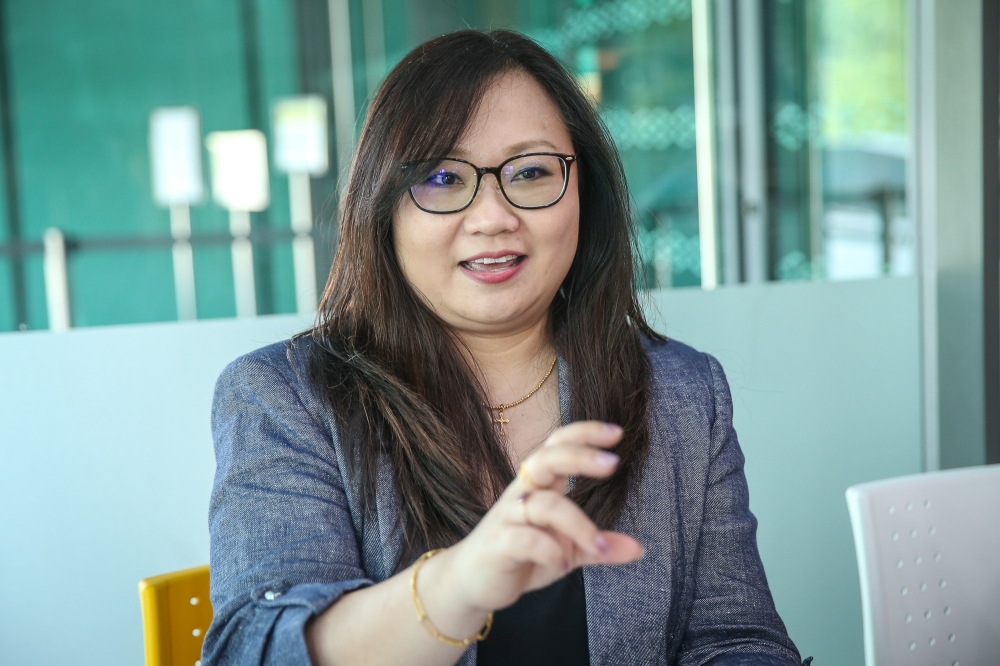 Co-curator Gabrielle Evelyn Lee speaks to Malay Mail during an interview in Kuala Lumpur July 22, 2024. — Picture by Yusof Mat Isa