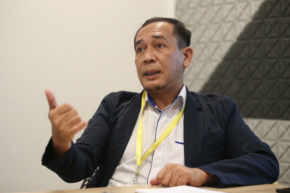 Yayasan Digital Malaysia COO Ahmad Faizal Zulkipli speaks to Malay Mail during an interview at CelcomDigi Tower in Petaling Jaya, Selangor. — Picture by Yusof Mat Isa 