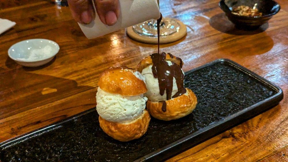 Like a kid on Christmas morning: the Baby Brioche & Ice-Cream Sandwich is a dessert that inspires joy. — Picture by Ethan Lau