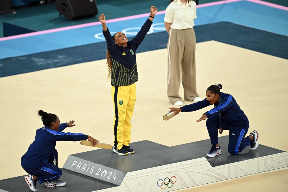 Simone Biles may have been the star of the show but she was widely praised for bowing to her arch-rival Rebeca Andrade on the podium. — AFP pic