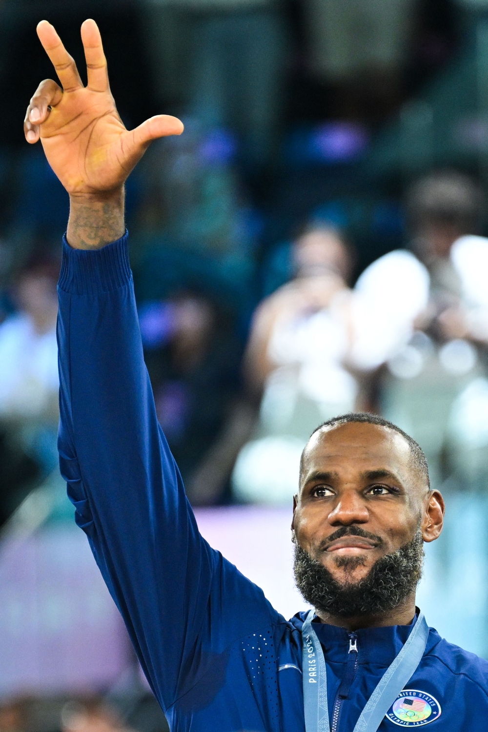 The NBA’s all-time leading points scorer secured his third Olympic gold medal with US in a hard-fought 98-87 win against France. — AFP pic