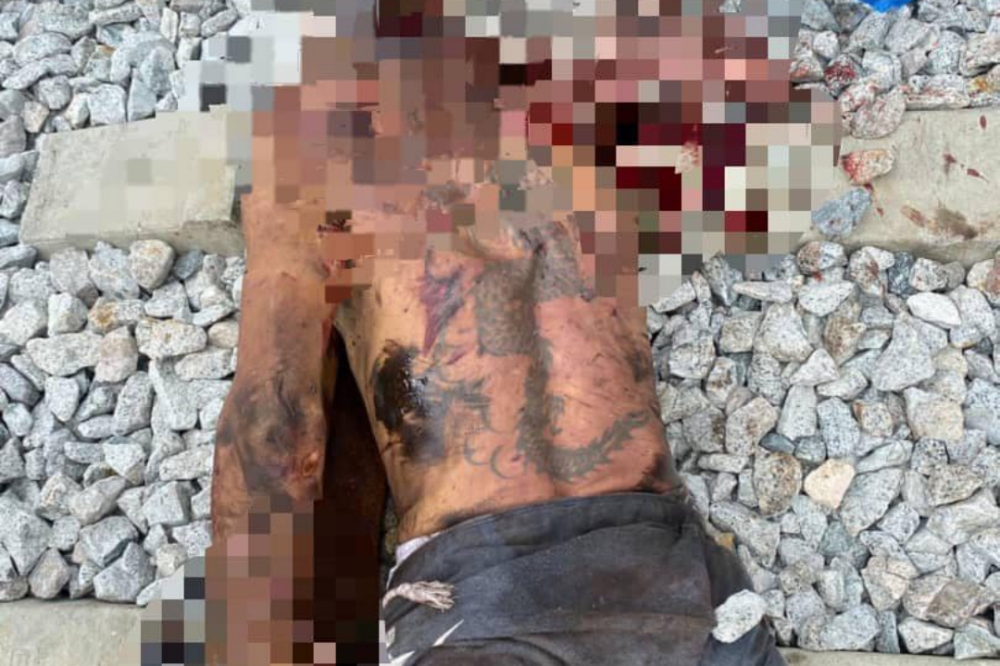 He was found with a dragon tattoo on his back.  — Picture from Facebook/Polis Johor Baru Selatan