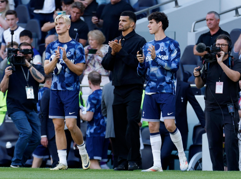 Tottenham Hotspur have signed striker Dominic Solanke (centre) from Bournemouth on a deal that will run until 2030, the North London club announced. — Reuters pic