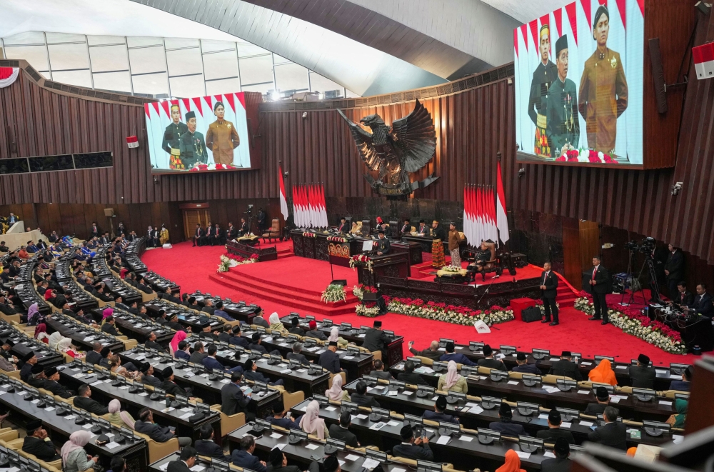 Indonesian President Joko Widodo, wearing a traditional Jakarta outfit, delivers his annual State of the Nation Address, ahead of the country's Independence Day, in Jakarta August 16, 2024. — Tatan Syuflana/Pool pic via Reuters 