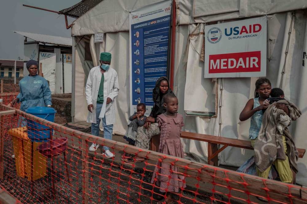 Patients wait outside the consultation room of the Mpox treatment centre at the Nyiragongo general reference hospital, north of the town of Goma in the Democratic Republic of Congo August 16, 2024. — AFP pic