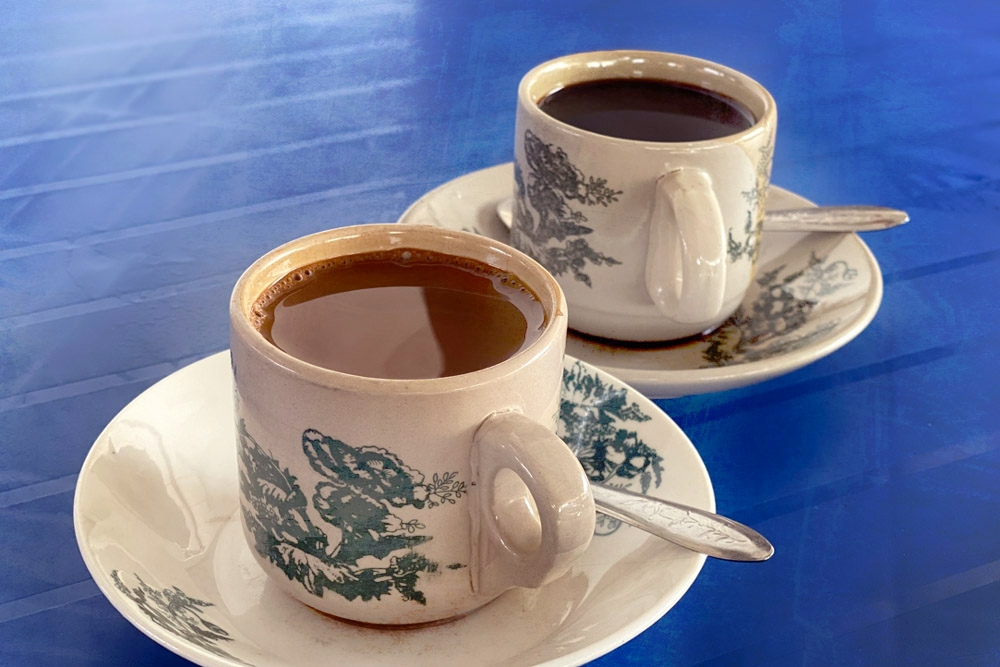 The requisite cups of 'kopi O' and 'cham'. — Picture by CK Lim