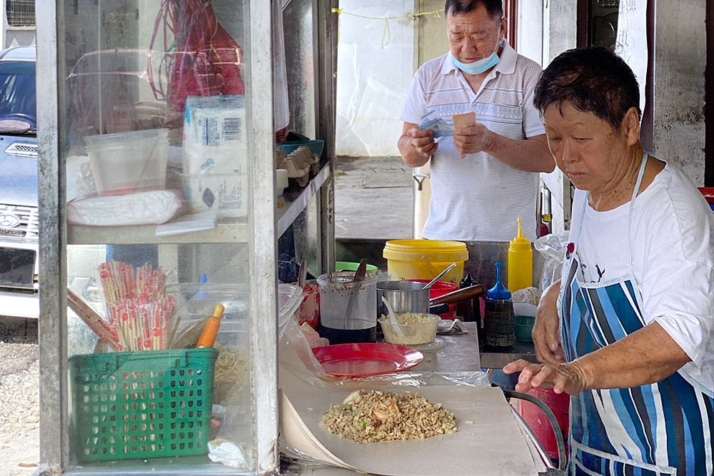 The 'char kway teow' auntie also cooks fried 'tong fun' and fried rice. — Picture by CK Lim