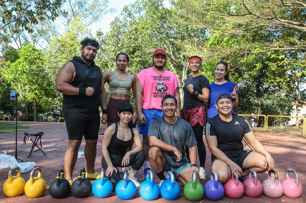 At a recent session in the park: (standing from left) Farhan Ariff, Cheryl Raj, Hazwan Nadzri, Aishah Samin, Sharifah Nadia and (bottom from left) Jane Mok, Muiz Tajul and Alvin Lambino. — Picture by Yusof Mat Isa