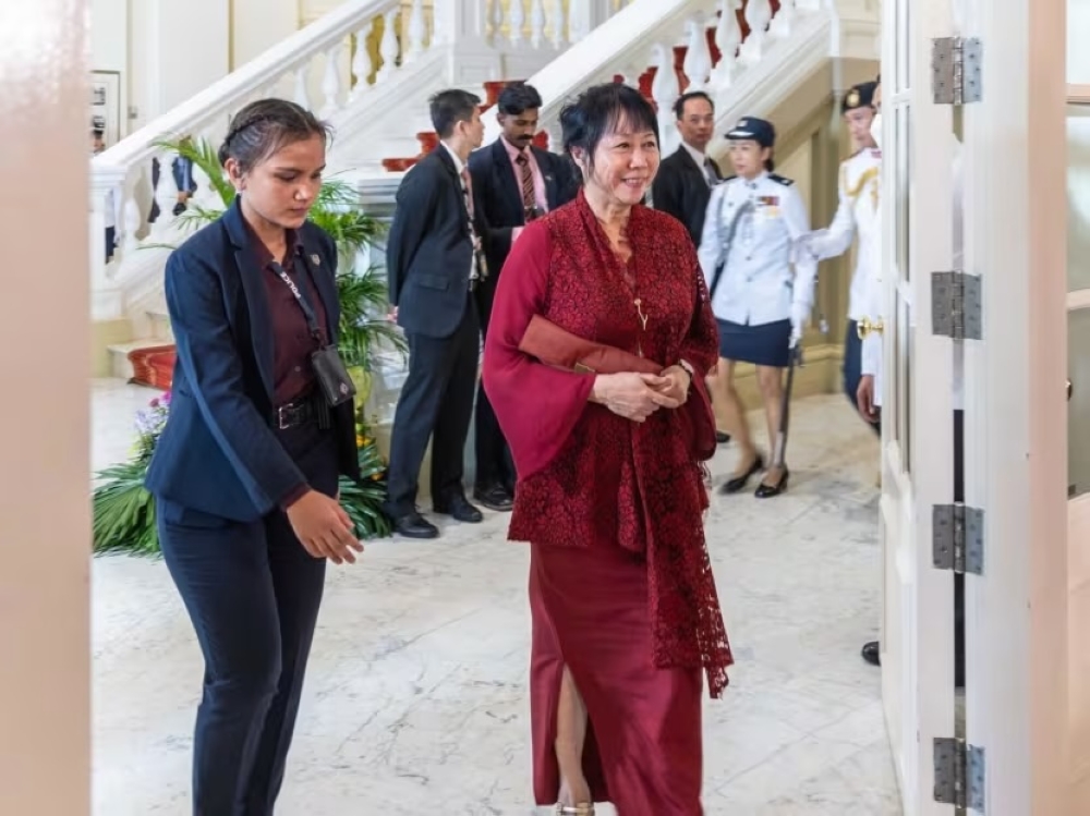 Lim Hwee Yi and Jane Ittogi, wife of Singapore president Tharman Shanmugaratnam, at the Istana on September 14, 2023 for his inauguration. — Picture via TODAY