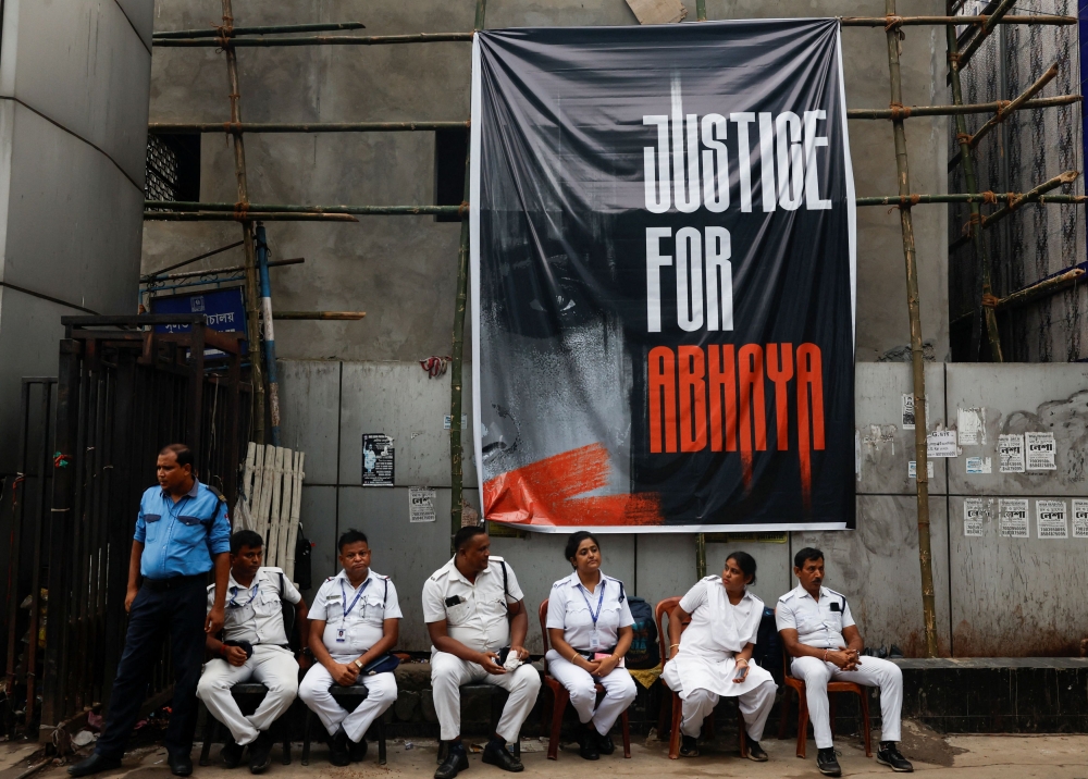 Security officers keep guard inside the premises of RG Kar Medical College and Hospital in Kolkata August 16, 2024. — Reuters pic  