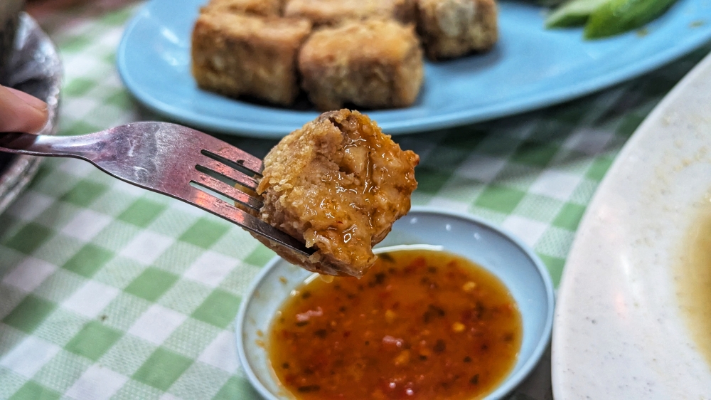 ‘Otak-otak’ in fried beancurd was as interesting as it was scrumptious. — Picture by Ethan Lau