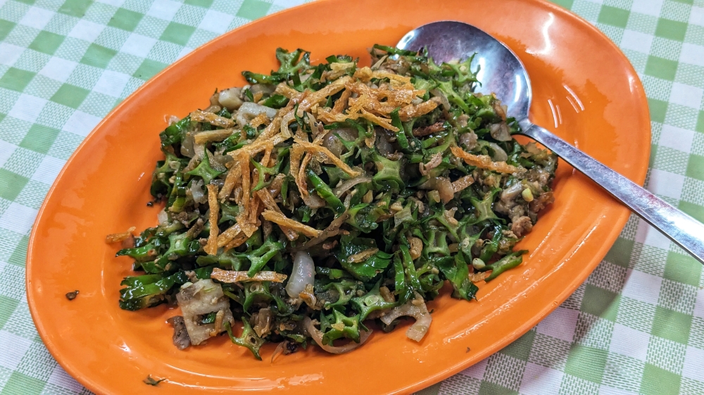 ‘Kacang botol’ fried with dried squid and lotus root was excellent. — Picture by Ethan Lau