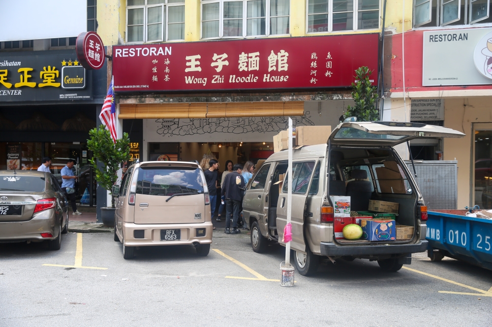 In September/October, look out for a night session at Wong Zhi Noodle House's flagship store where they will offer their version of Ipoh Cowan Street's chicken rice and Ah Boy Char Kway Teow who juggles frying the noodles in two woks simultaneously — Picture by Choo Choy May