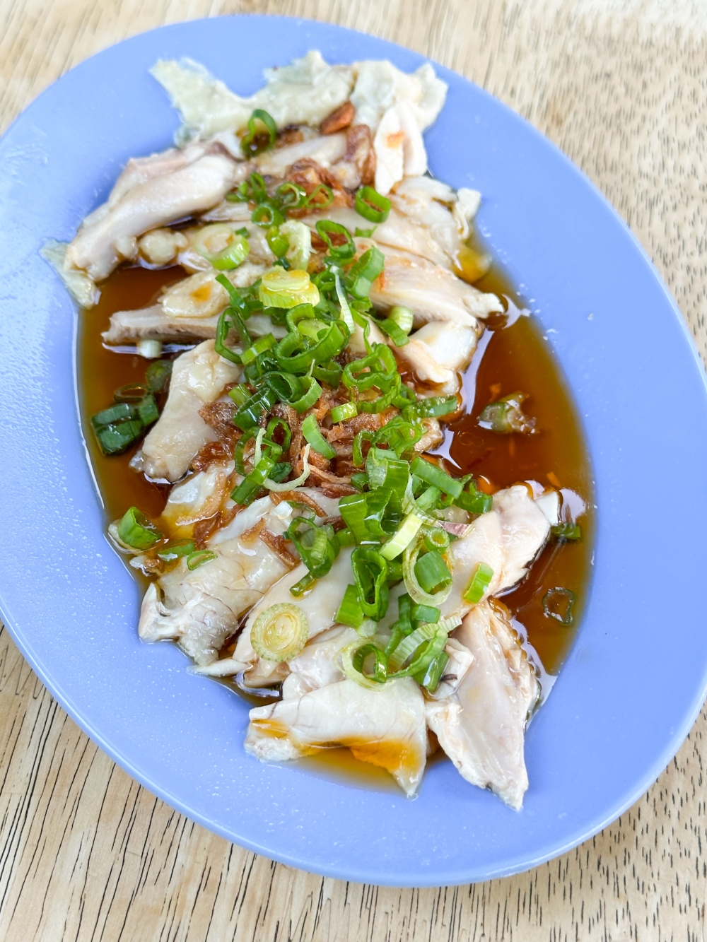 This stall at Damansara Heights Restoran Yum-Me Place also serves the deboned poached chicken with a decadent combination of soy sauce and prawn oil — Picture by Lee Khang Yi