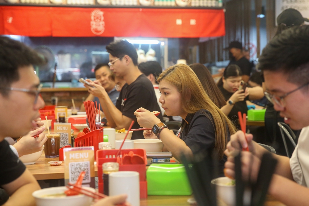 The best way to enjoy the ‘kai si hor fun’ is slurping it all down to the last drop — Picture by Choo Choy May