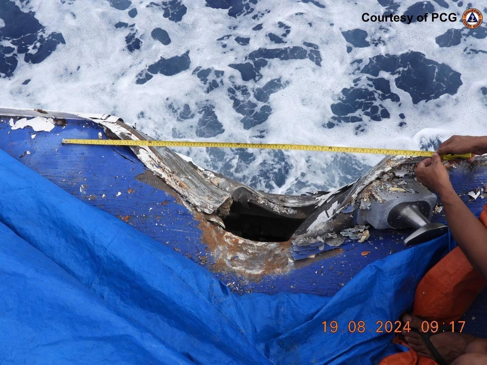 This handout photo taken and released by the Philippine Coast Guard (PCG) on August 19, 2024 shows damage to the Coast Guard ship BRP Cape Engano (MRRV-4411) following a collision with a Chinese coast guard vessel near Sabina Shoal in disputed waters of the South China Sea. 