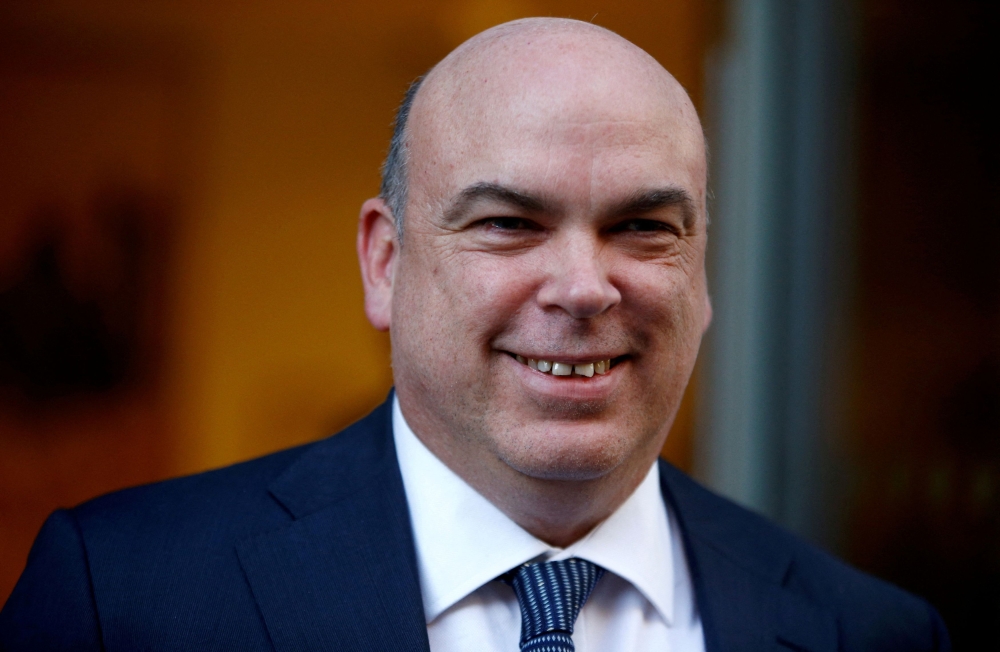 British entrepreneur Mike Lynch leaves the High Court in London March 25, 2019. — Reuters pic  