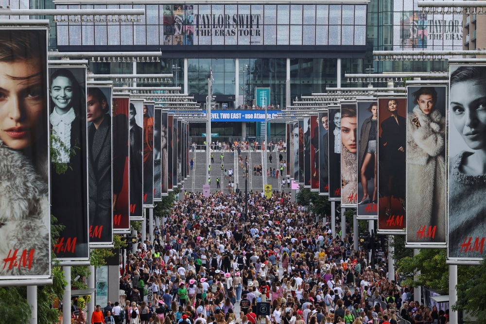 Fans make their way towards Wembley Stadium for a Taylor Swift concert, following the cancellation of three Taylor Swift concerts in Vienna because of a planned attack, in London August 15, 2024. — Reuters pic  