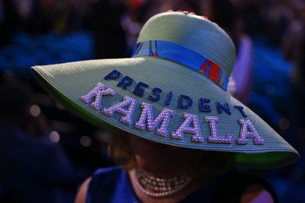 An attendee wears a hat supporting Democratic presidential nominee and U.S. Vice President Kamala Harris at the United Center, ahead of Day 3 of the Democratic National Convention (DNC) in Chicago, Illinois, U.S., August 21, 2024. — Reuters pic  