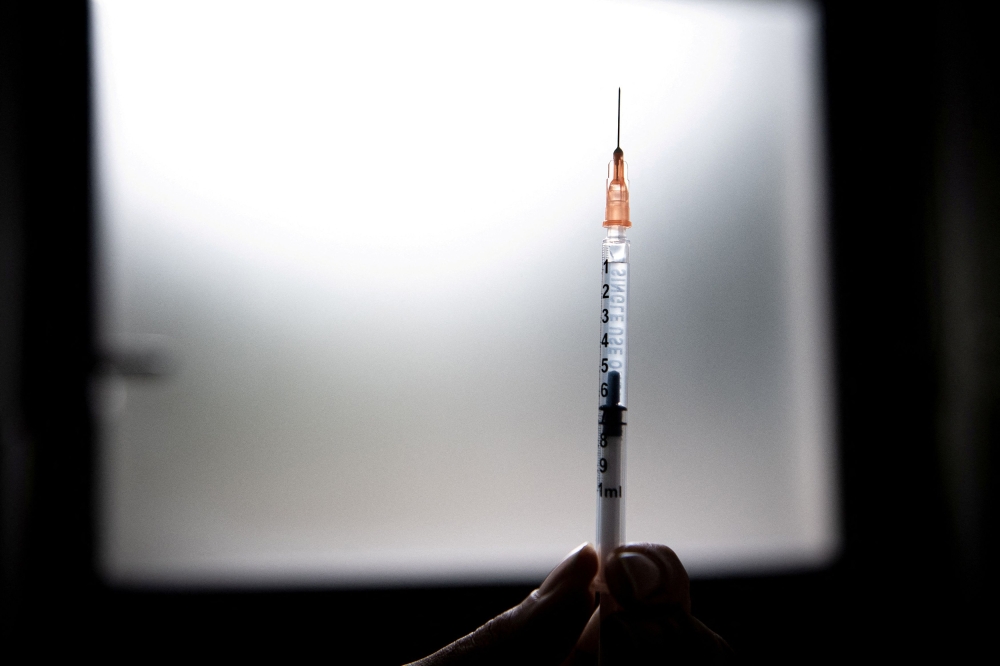 A medical health worker prepares a dose of the mpox vaccine at the Edison municipal vaccination centre in Paris July 27, 2022. — Alain Jocard/Pool pic via Reuters  