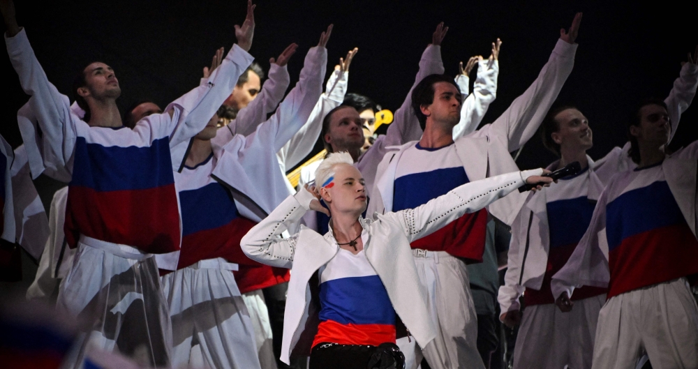 Pro-Kremlin Russian pop idol Shaman (Yaroslav Dronov), dressed in the colours of the national flag, performs during a concert on Red Square on Flag Day in Moscow August 22, 2024. — AFP pic