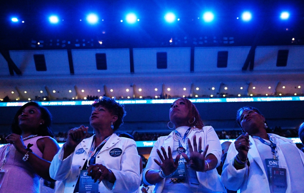 Attendees wear 'Suffragette White' on Day 4 of the Democratic National Convention (DNC) at the United Center, in Chicago, Illinois, U.S., August 22, 2024. — Reuters pic