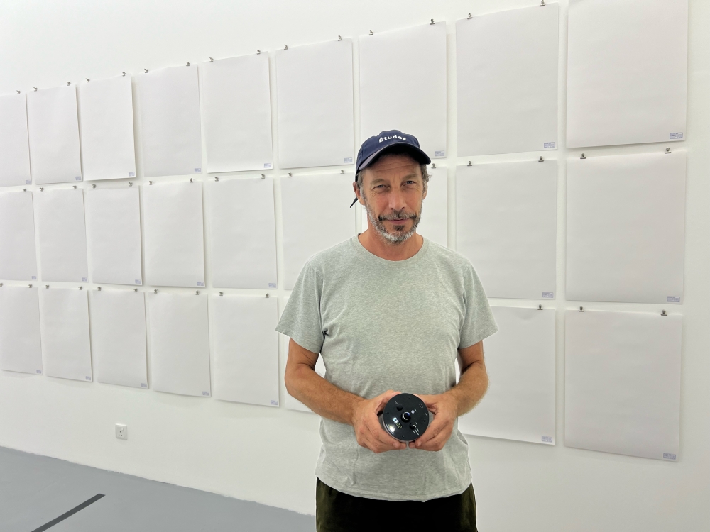 French artist Éric Baudelaire holds a tychoscope used in his ‘What it is of’ exhibition. — Picture by Opalyn Mok