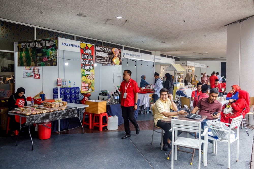 A general view of food vendors and an eating area at the 2024 Umno General Assembly at the World Trade Centre Kuala Lumpur August 23, 2024. — Picture by Firdaus Latif