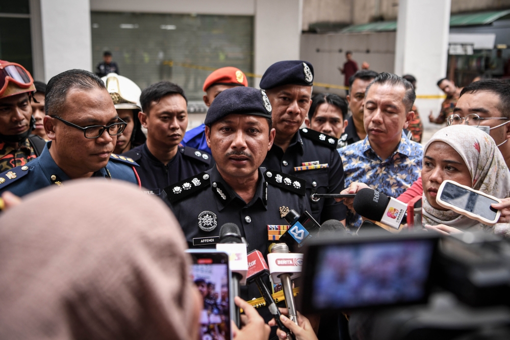 Dang Wangi police chief Assistant Commissioner Sulizmie Affendy Sulaiman speaks to the press at the site of a sinkhole in Masjid India that swallowed an Indian tourist on August 23, 2024. — Bernama 