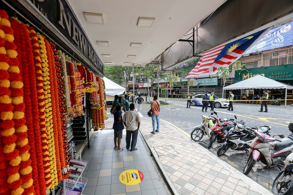 A general view of the area as store operators still open business despite a nearby sinkhole that appeared at Jalan Masjid India August 25, 2024. — Picture by Sayuti Zainudin