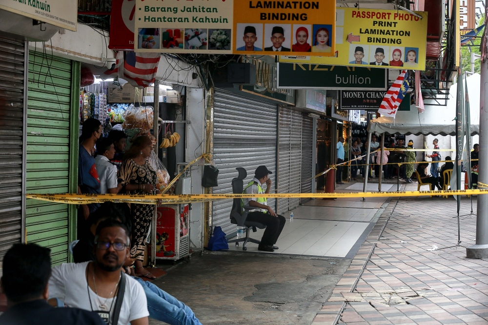 A general view of the area as some store operators still open business despite a nearby sinkhole that appeared at Jalan Masjid India August 25, 2024. — Picture by Sayuti Zainudin