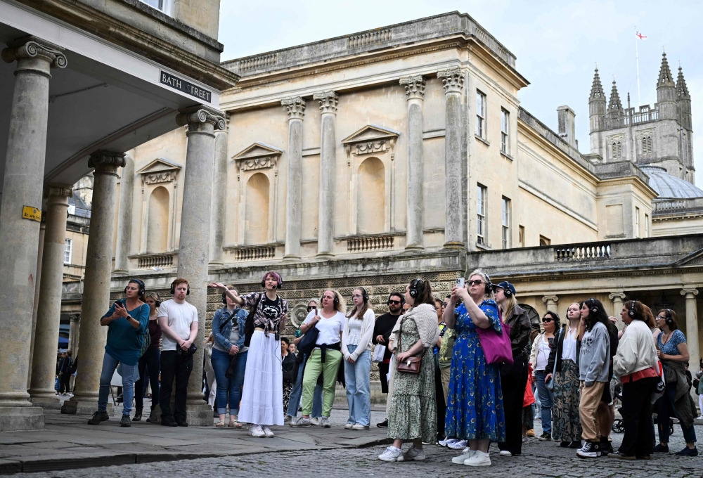 Film student and tour guide Ruby Maidment dished out historical anecdotes alongside snippets about ‘Bridgerton’. — AFP pic