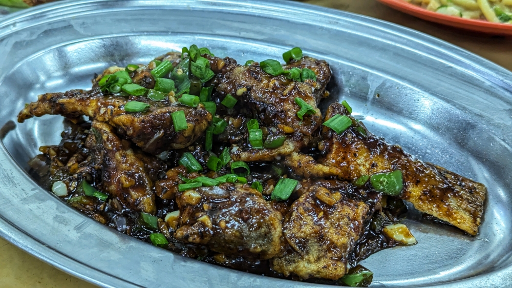 Layers of funk flavour these pieces of ‘ma yau ’ fish fried in black bean sauce. — Picture by Ethan Lau