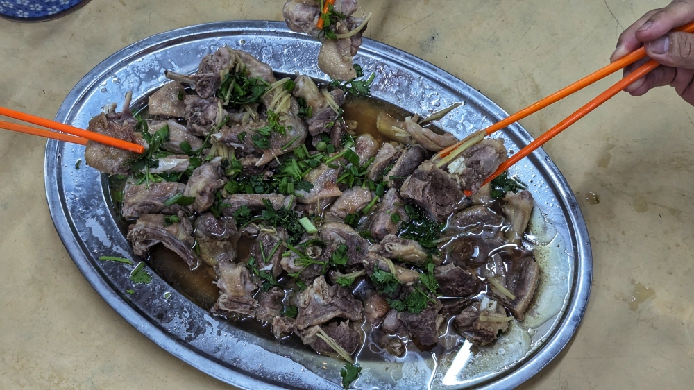 Muscovy duck prepared like chicken: lightly cured in salt and steamed with ginger and Shaoxing wine. — Picture by Ethan Lau