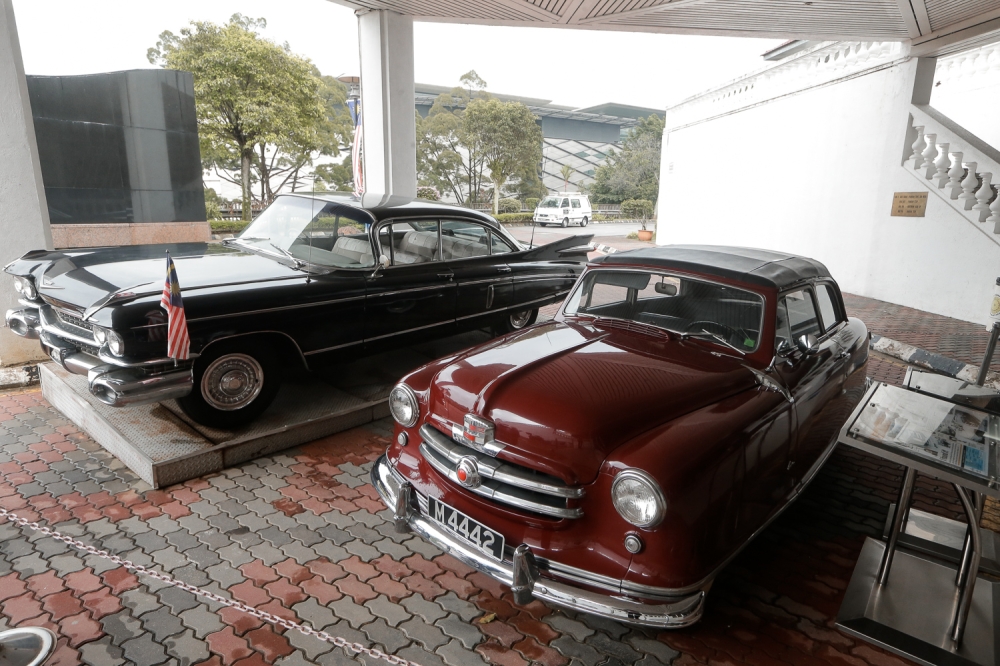 The prime minister's official car and the Merdeka car on display at the Memorial of Tunku Abdul Rahman in Kuala Lumpur on August 25, 2024. — Picture by Raymond Manuel