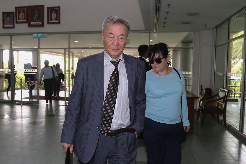 (From left) Altantuya Shaariibuu's father Dr Shaariibuu Setev and her cousin Namiraa Gerelmaa arrive at Shah Alam Hight Court in this file picture taken on January 30, 2019. —  Picture by Yusof Mat Isa