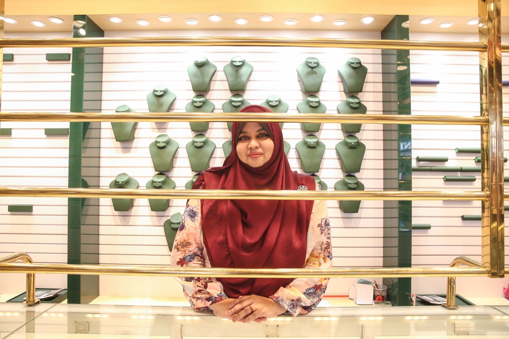 Goldsmith store worker Sharine Sarine Shamima Bahurdeen is photographed during an interview with Malay Mail at Jalan Masjid India in Kuala Lumpur on August 29, 2024. — Picture by Yusof Mat Isa