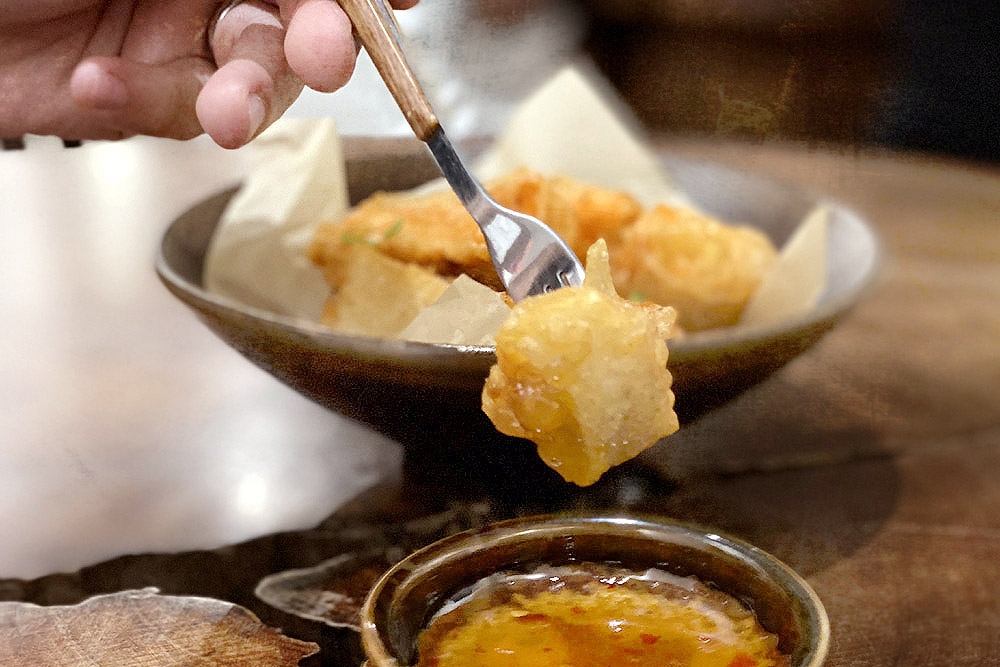 Fried Salmon Belly with black pepper and Thai chilli sauce. — Picture by CK Lim