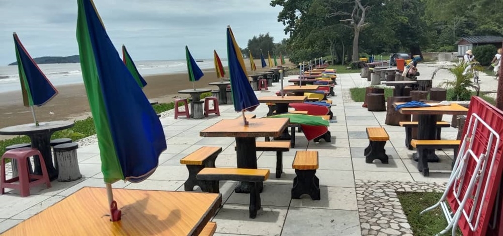 The management of Tanjung Aru first beach, where a video of sunset tables and chairs went viral, has clarified that using these facilities is entirely optional. — Picture courtesy of Tanjung Aru Eco Development Sdn Bhd 