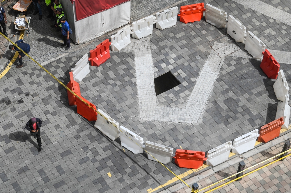 A general view of another sinkhole at Jalan Masjid India about 50 metres from where the first one formed, Kuala Lumpur August 28, 2024. — Picture by Yusof Mat Isa